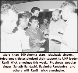 More than 300 cinema stars, playback singers, teledrama srtistes pledged their support to UNP leader Ranil WIckremesinge this week. Pic shows popular singer Sanath Nandasiri, Ravindra Randeniya and others will Ranil Wickremesinghe