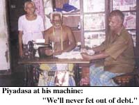 Piyadasa at his machine: We'll never get out of debt.