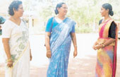 These three Puttalam district female candidates from rival parties - Mary Larin Perera (UNP), Sriyani Fernando (PA) and Hemamali Nilangani (JVP) - appears to be discussing a campaign sans violence which is generally resorted go by male politicians. Pic by Hiran Priyankara Jayasekera