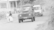 A Defender Land Rover and another vehicle carrying unindentified armed men during last Wednesday's polls in a picture taken by cameraman J. Weerasekera