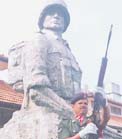 The brave soldiers who fought against LTTE to save the country and the soldiers who are missing inaction were remembered at a ceremony held at Panagoda Regiment on Friday. Picture shows a soldier saluting against a background of a Ranaviru statue. Pic by Athula Devapriya