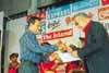 Ranjith Ananda Jayasinghe of Lankadeepa receiving the Mervyn de Silva award for the Journalist of the Year from Neville de Silva