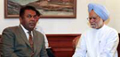Foreign Minister Mangala Samaraweera speaks with Indian Prime Minister Manmohan Singh during a meeting in New Delhi on Thursday. AFP