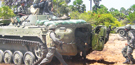 Troops near Russian built armoured troop carriers at the Muhamalai defences.