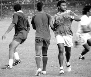 The Lankan team hard at practices - Pix by Berty Mendis