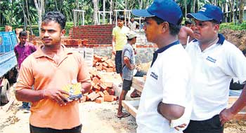 Company officials at a work site.