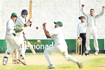 Going a begging…..National player T.M. Dilshan jumps anxiously as a Bloomfield close-in fielder drops a chance offered by BRC batsman Chamara Soysa off his bowling.  Pic By  Saman Kariyawasam
