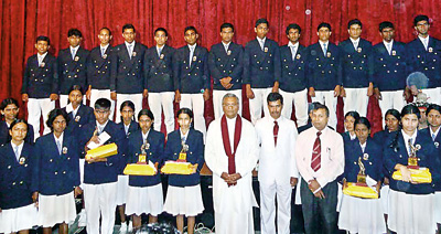 The student who obtained good results in G.C.E.(A/L) examination, 2012 with Chamal Rajapaksa, Speaker of Parliament