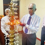 Mr. N I N S Nadarasa lighting the Oil Lamp