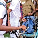 Searching school bags in Batticaloa (above) and (below) in Puttalam. Pix by Deva Adiran and Hiran Priyankara