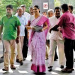 Hirunika Premachandra seen with an SJB team at the Colombo District Secretariat