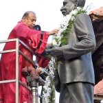 Photograph shows garlanding the statue of  D S Senanayake.