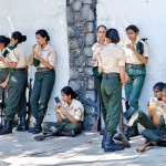 Galle Face Refreshing break: Cadets lay down their arms to sip on milk packets. Pix by Eshan Fernando