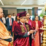 Mr. N.M.S. Hettigedara , President lighting the oil lamp