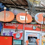 Mattakkuliya Scrap metal: Broken dish antennae in with bulb sockets hanging off them. Pix by M A Pushpa Kumara