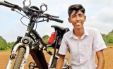 Schoolboy transforms regular mountain bicycle into e-bike