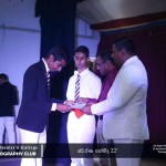 Principal Asela Ravindra Ranasinghe presents awards.