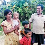 Shantha Kumar, who is now jobless, with his family