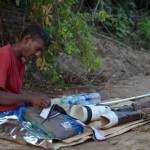 Mending things: A cobbler repairs a bag. Pix by Eshan Fernando