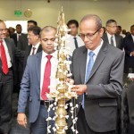 Chief Guest Mr. D. R. S. Hapuarachchi, Commissioner General of Inland Revenue lighting the oil lamp in the presence of Mr. Sanjaya Bandara, President of CA Sri Lanka.