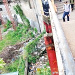 Garbage tossed over the wall