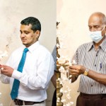 Lighting the oil lamp by Dr. Sameera R. Gunathilake, the senior lecturer CCS and Mr. N.I.N.S Nadarasa, the Senior Administrative Executive of IChemC.