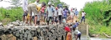 Residents forced to rebuild  bridge at their own cost