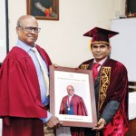 Mr. K.R Dayananda recieving the award
