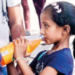 TAJ-09---Child-enjoys-cool-drinks