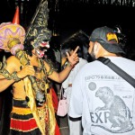 Gangaramaya: Dramatic turn: A costumed artiste Pic by Nilan Maligaspe