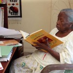 97-year-old  Leelawathi Aslin Dharmarathna: Now in the process of writing a novel and (left) attending to daily chores. Pix by Suranga Rajanayaka