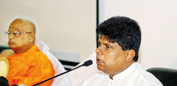 Diyawadana-Nilame-Pradeep-Nilanga-Dela-addresing-the-invitees-and-other-representatives.--The-Anunauyake-Thera-is-on-his-right.._9