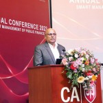 Chairman of CTC Ltd, and Head of the SOE Restructuring Unit of the Ministry of Finance Mr. Suresh Shah delivering his speech.