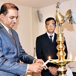 The President-elect of the Paediatric Orthopaedic Society of Sri Lanka (POSSL), Dr. Dimuthu Tennakoon lighting the lamp at the launch of the POSSL, with the President of the Sri Lanka Orthopaedic Association, Dr. Bandujeewa Piyasena looking on