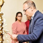Lighting the oil lamp by the dean of CCS, Prof Sriyanthi Deraniyagala and the chief guest Mr. Graham Marshall
