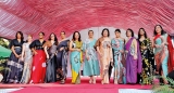 Diplomats on catwalk for a cause