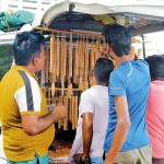 Colombo: All that glitters: A chain salesman attracts buyers Pix by M A Pushpa Kumara