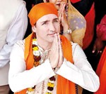 Trudeau taking part in  a Sikh religious event