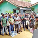 Wildlife officials and others all set for a jumbo task.  Pix by  Hiran Priyankara