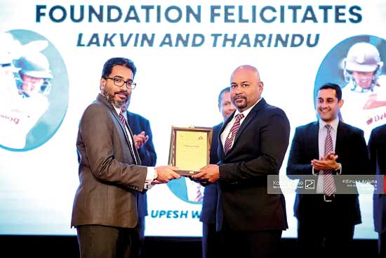 Coach-Upesh-Wijesiri-receiving-his-award-from-Mahesh-Karunarathne,-Principal-of-Dharmaraja-College_BP