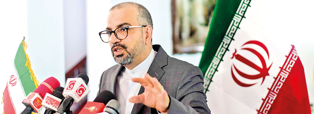 Iran’s envoy says his country won’t close Hormuz Strait, citing ties with friendly nations