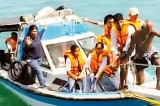 Boat sinks soon after passengers and crew are rescued Boat sinks soon after passengers and crew are rescued