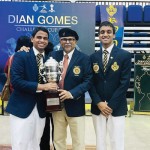 Royal captain Janidu Waduge (left) and vice captain Kesara Dissanayake receive the Dian Gomes Challenge Cup 2025 from the chief guest Dian Gomes himself