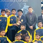 Wickramasheela National School captain receives the Ajith Siyambalapitiya Trophy from chief guest Dian Gomes