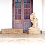 A Buddha statue left  on corridor