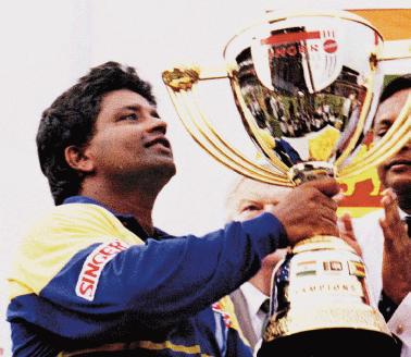 Arjuna accepting the Singer trophy