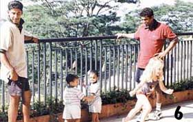 A watchful eye: Vaas and Murali with the kids