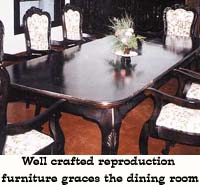 Well crafted reproduction furniture graces the dining room