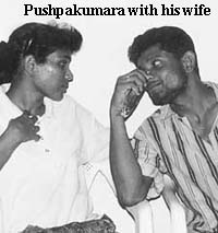Pushpakumara with his wife