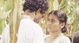 Linton Semage and Shaymalie Warusavithana in a scene from the movie